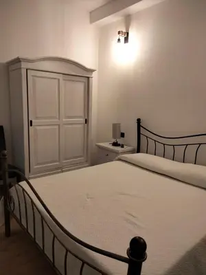Letto o letti in una camera di Casa Janas Affittacamere Bed & Breakfast