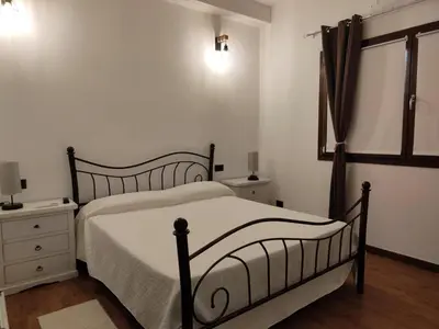 Letto o letti in una camera di Casa Janas Affittacamere Bed & Breakfast