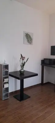 TV o dispositivi per l'intrattenimento presso Casa Janas Affittacamere Bed & Breakfast