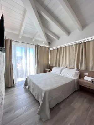 Letto o letti in una camera di Affittacamere Su Caboni