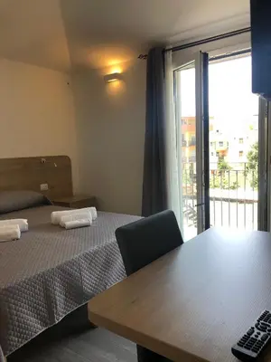 Letto o letti in una camera di Affittacamere Su Caboni