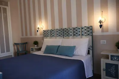 Letto o letti in una camera di A casa di nonna