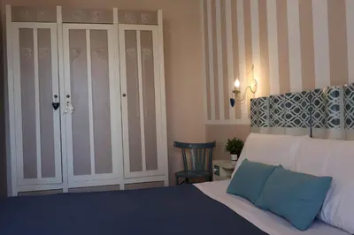 Letto o letti in una camera di A casa di nonna