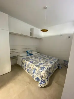Letto o letti in una camera di Torregrande Apartments