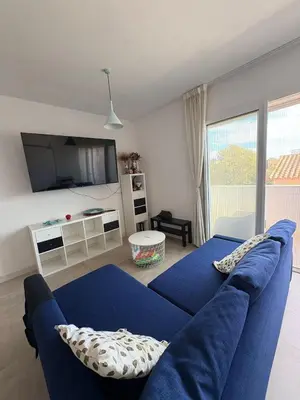TV o dispositivi per l'intrattenimento presso Torregrande Apartments