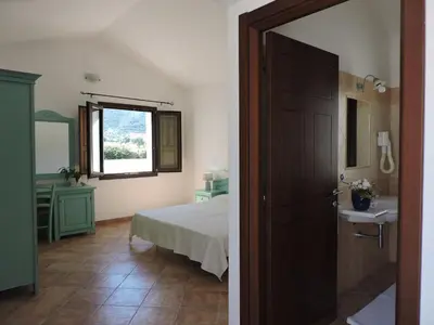 Letto o letti in una camera di Cort'e Nastasj