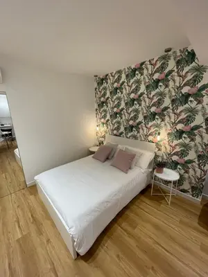 Letto o letti in una camera di Vento Suites