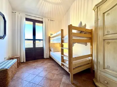 Letto o letti in una camera di Casa Luisa