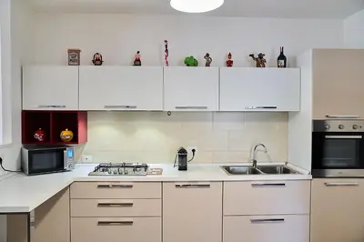 Cucina o angolo cottura di Casa Rosita Spazio Comfort e Relax 130mq con 3 Camere