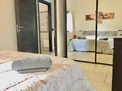 Letto o letti in una camera di Albachiara