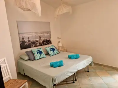 Letto o letti in una camera di Villetta with heated pool and panoramic view