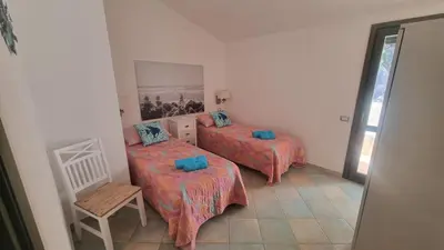 Letto o letti in una camera di Villetta with heated pool and panoramic view