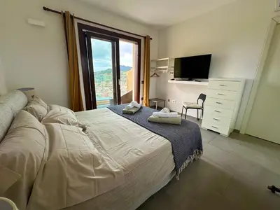 Letto o letti in una camera di Studios con vista
