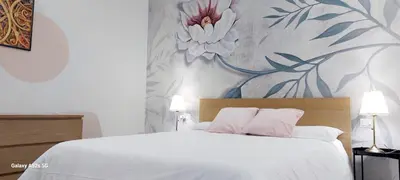 Letto o letti in una camera di Benny's rose house