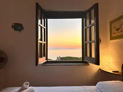 Letto o letti in una camera di Appartamento con vista mare a Terramala