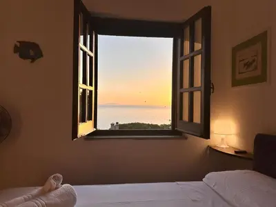 Letto o letti in una camera di Appartamento con vista mare a Terramala
