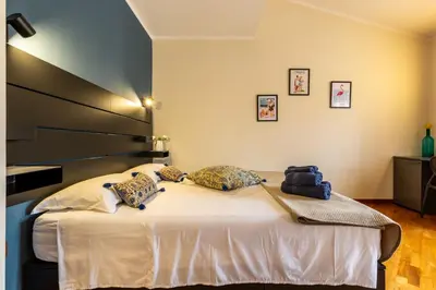 Letto o letti in una camera di Flamingo Poetto