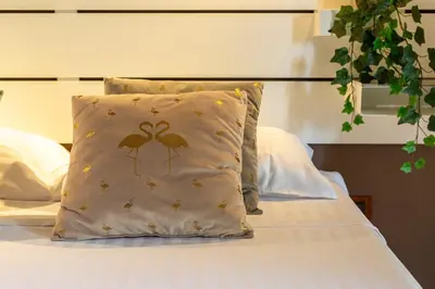 Letto o letti in una camera di Flamingo Poetto
