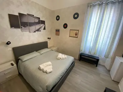 Letto o letti in una camera di B&B La Sinfonia