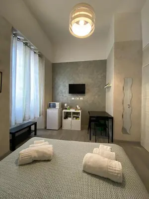 Letto o letti in una camera di B&B La Sinfonia