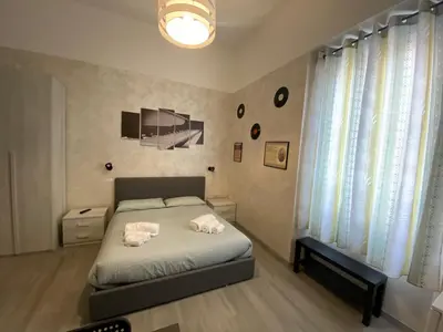 Letto o letti in una camera di B&B La Sinfonia