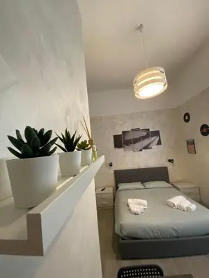Letto o letti in una camera di B&B La Sinfonia