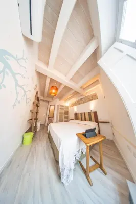 Letto o letti in una camera di B&B Terra - Stanza Natura