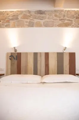 Letto o letti in una camera di B&B Terra - Stanza Natura