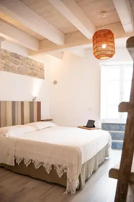 Letto o letti in una camera di B&B Terra - Stanza Natura