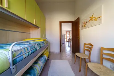 Letto o letti in una camera di Casa Vacanze il Limone