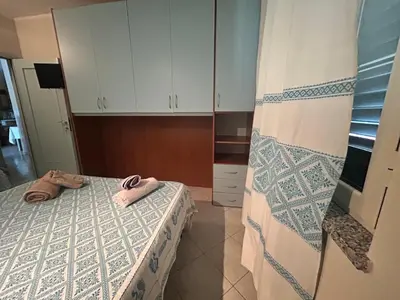 Letto o letti in una camera di Villa di Cristina