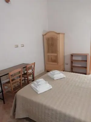 Letto o letti in una camera di Beni Benìus