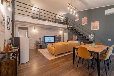 Area soggiorno di 3 MURA rooms
