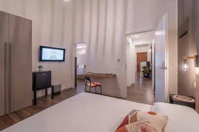Letto o letti in una camera di 3 MURA rooms