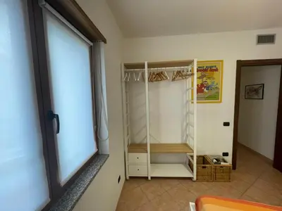 Letto o letti in una camera di Living Tortoli