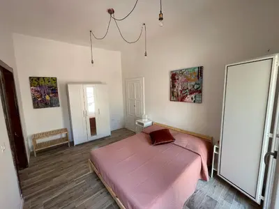 Letto o letti in una camera di La Rosa del Sulcis