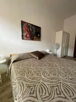Letto o letti in una camera di La Rosa del Sulcis