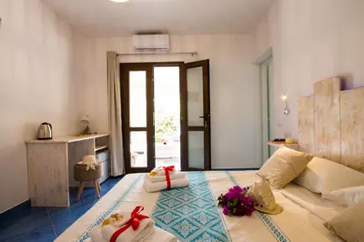 Letto o letti in una camera di Suites Voce del Mare