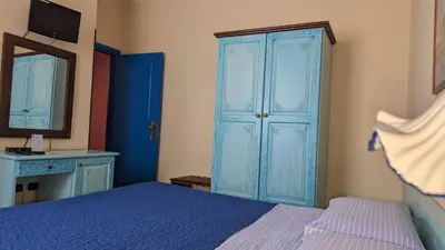 Letto o letti in una camera di Hotel Aquarius