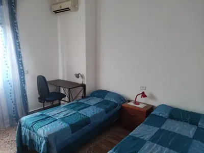 Letto o letti in una camera di Panorama Iglesias