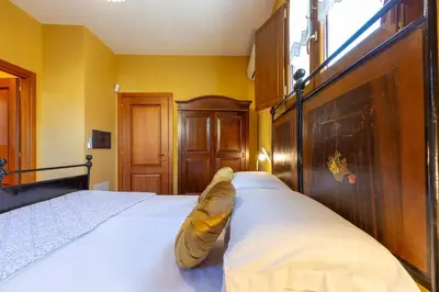 Letto o letti in una camera di B&B ANTICA KALAGONIS