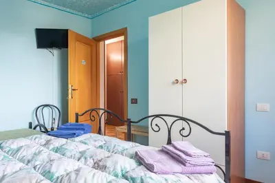 Letto o letti in una camera di B&B Il Mirto