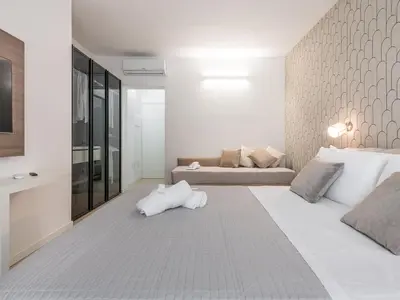 Letto o letti in una camera di Palazzo Michelangelo