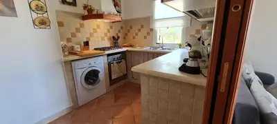 Cucina o angolo cottura di House Castiadas tra Mare e Montagna