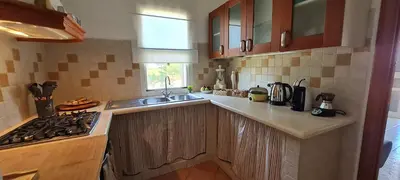 Cucina o angolo cottura di House Castiadas tra Mare e Montagna