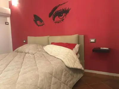 Letto o letti in una camera di Casa Claire