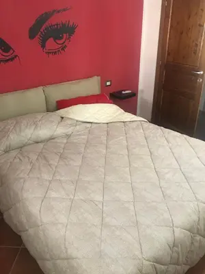 Letto o letti in una camera di Casa Claire