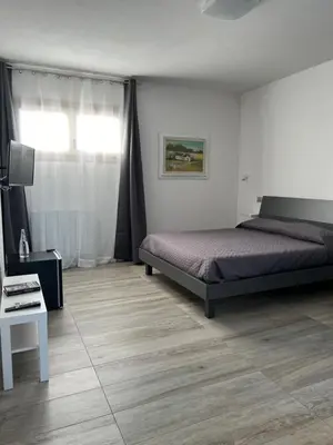Letto o letti in una camera di Villa INN