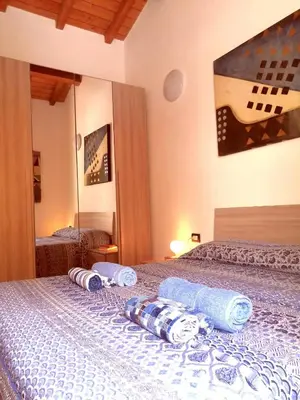 Letto o letti in una camera di La Dimora