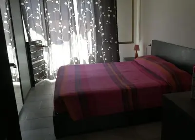 Letto o letti in una camera di Appartamento Monte Argentu